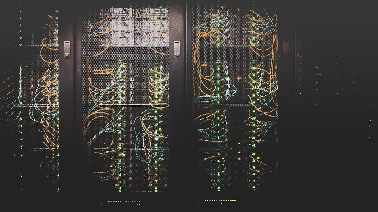 Blue-lit server rack for zero-downtime deployments